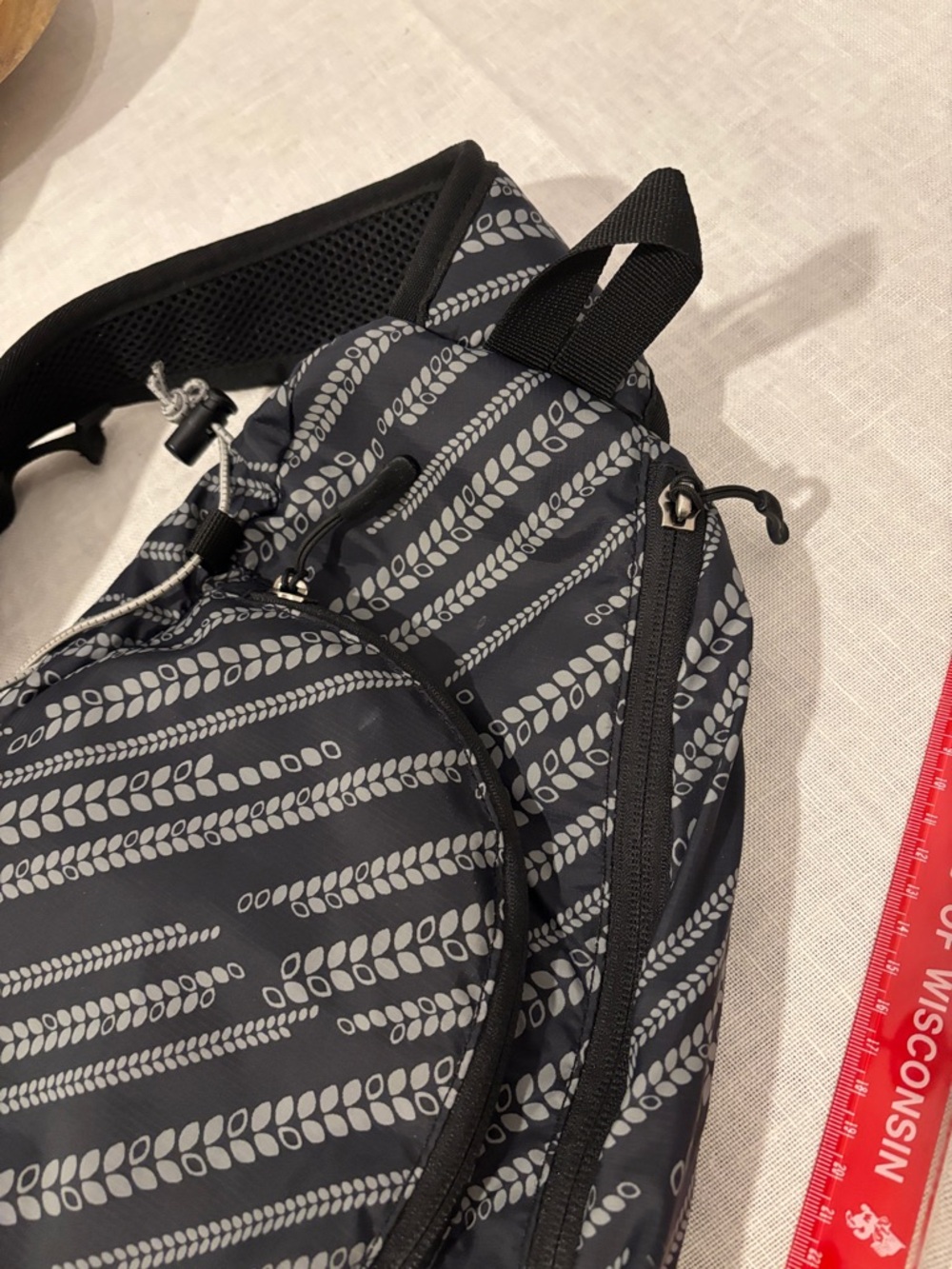 Eddie Bauer Black and Gray Patterned Sling Backpack - Picture 5 of 11